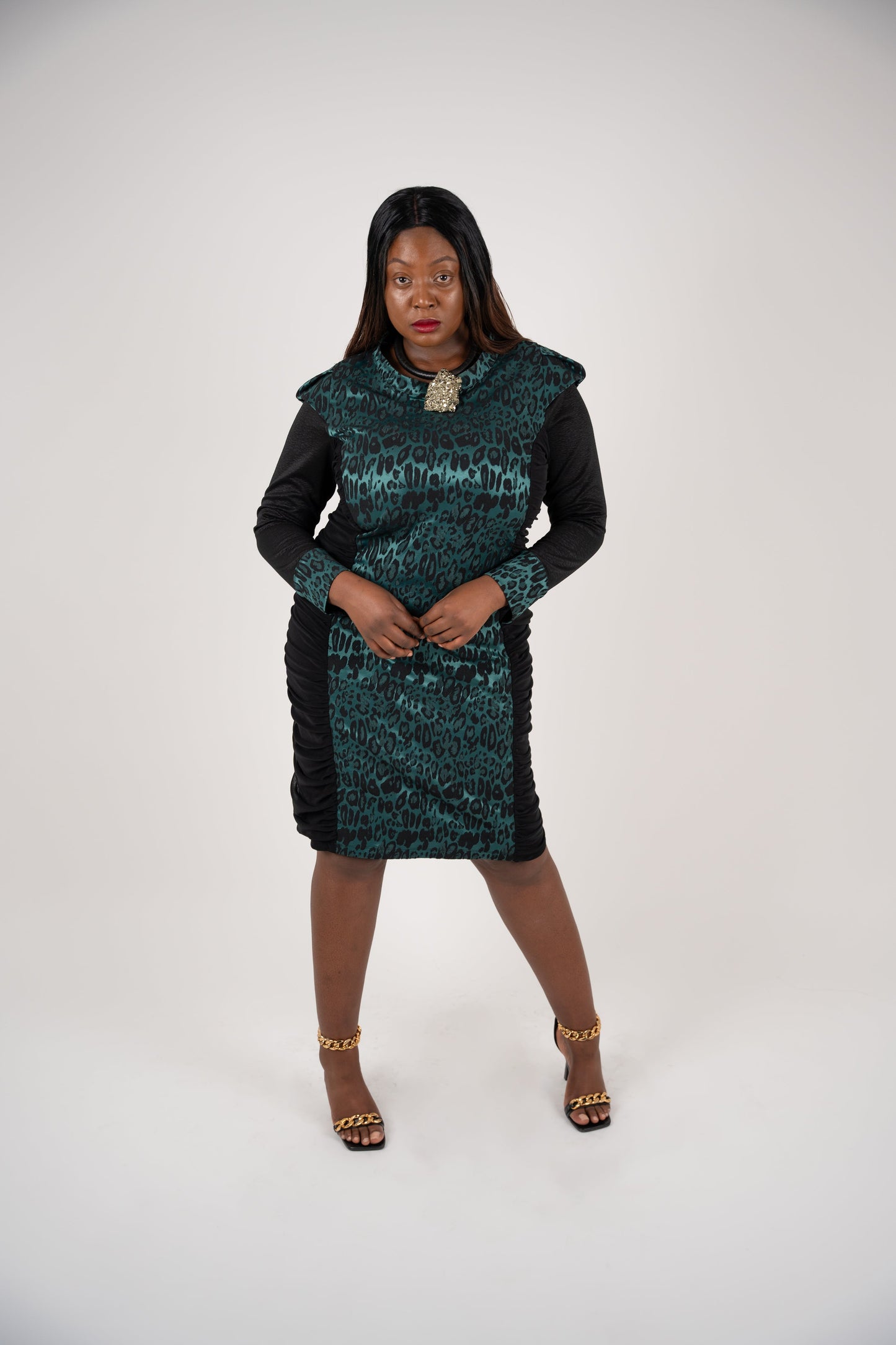 Women's Plus Size Black Forest Green Bodycon Midi Leopard  Jacquard Dress styled with Pyrite Jewellery by Veronique Design and gold chain heels for an elegant, polished look.