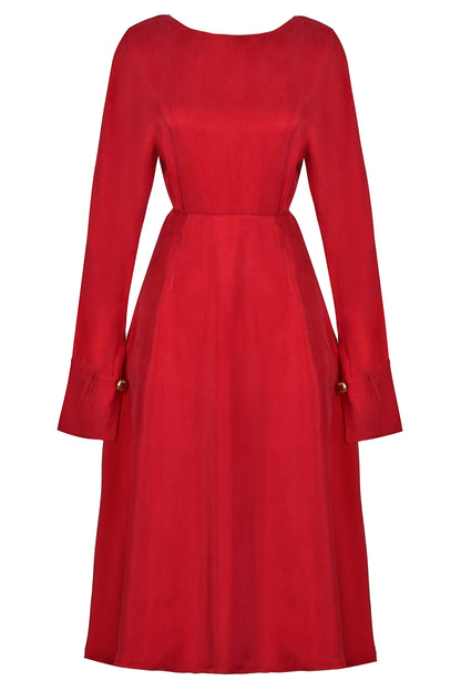 a Sarvin Long Sleeve Midi Dress with pockets.