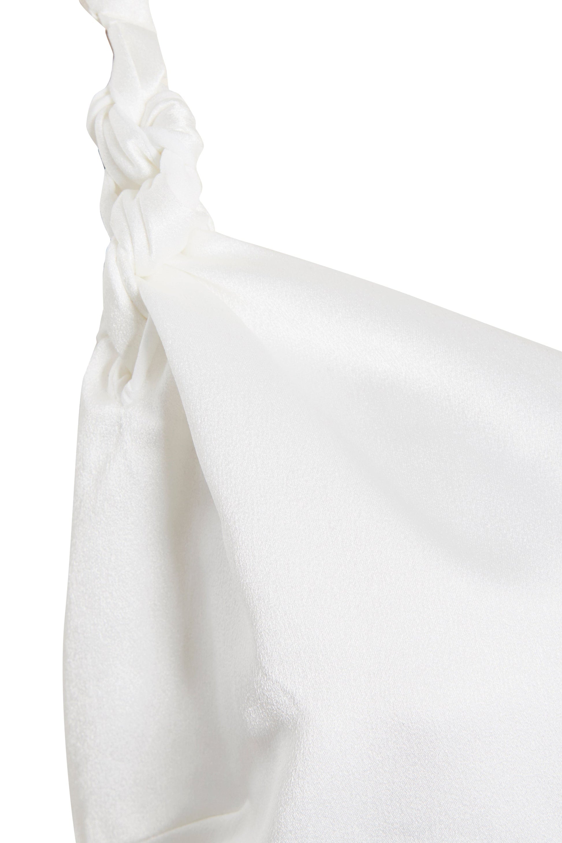 a close up of an Asymmetric White Maxi Dress by Sarvin with a knot on it.