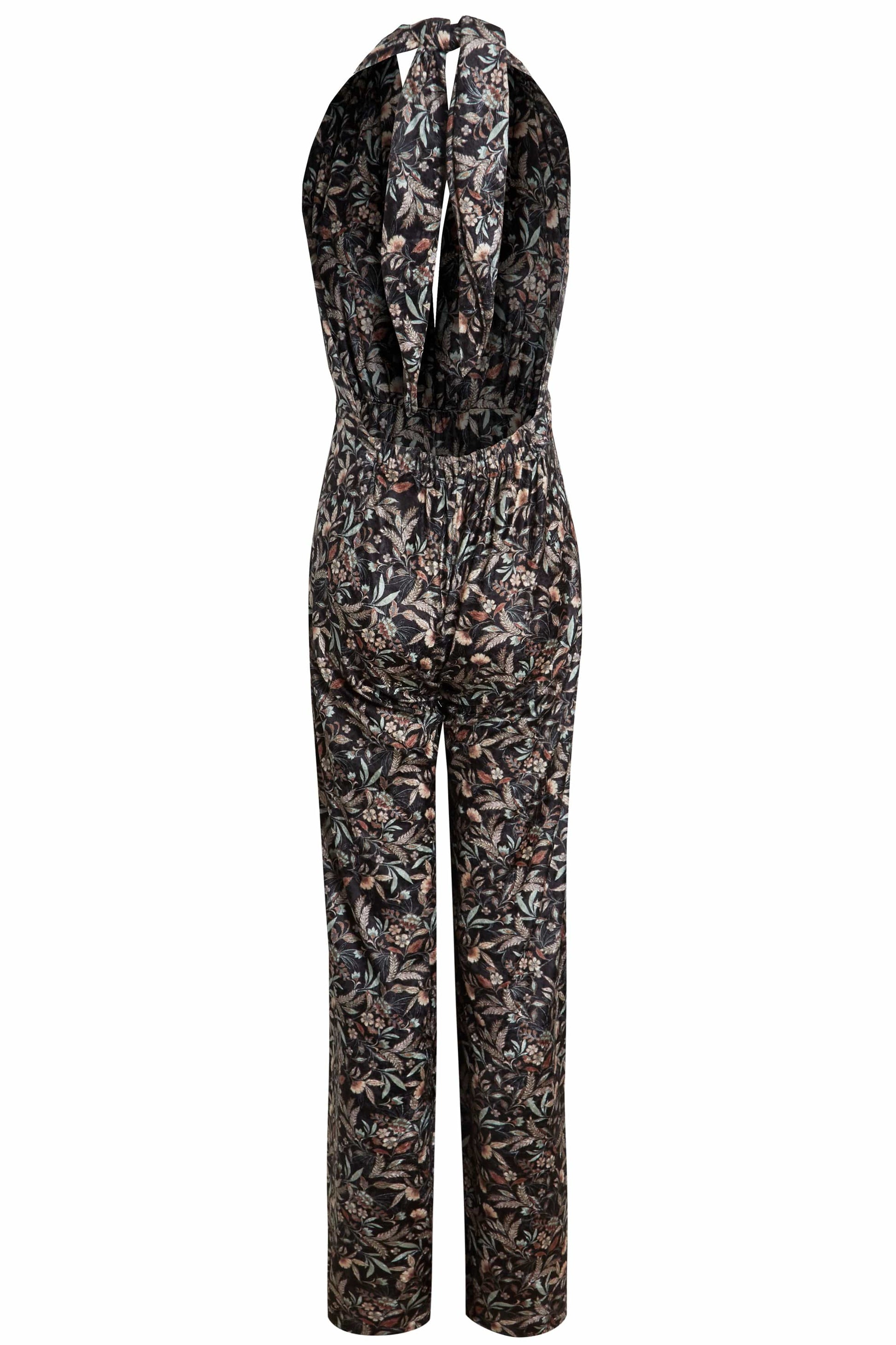 A Sarvin Floral Velvet Backless Jumpsuit on a white background.