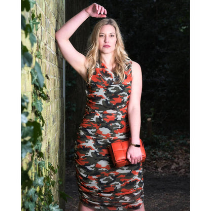 Women's Summer Mid Size Orange Green Grey Camouflage Bodycon Midi Dress styled with an orange handbag a for a modern, stylish look.