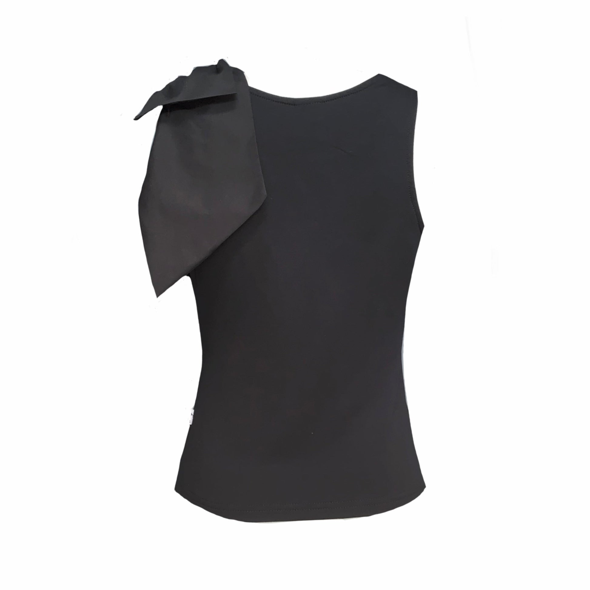 This is a round neck sleeveless top in black silhouetted against a white background. This is the back of the top. It has an oversized decorative bow sitting proudly over the left shoulder.  